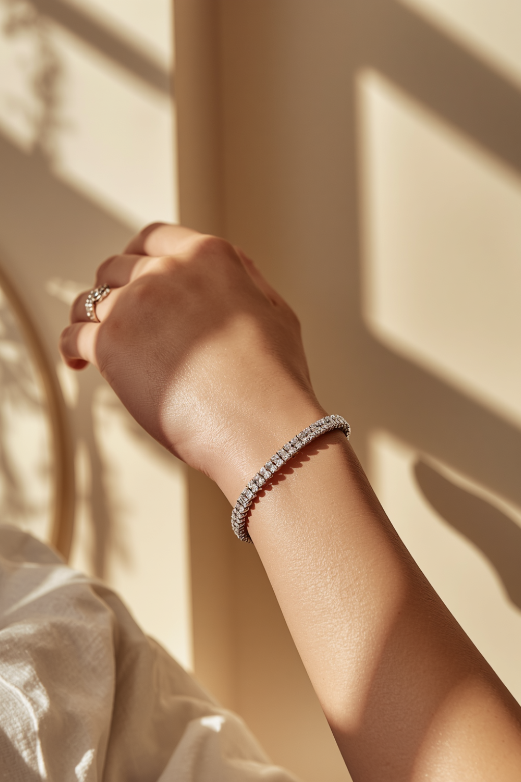 The Valdor Éclat Tennis Bracelet worn on wrist gold-finished tennis bracelet with diamond-like stones, refined and elegant everyday luxury