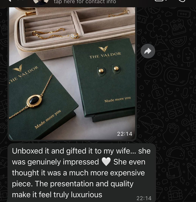 Green jewelry box with necklace and earrings on a light surface, with text overlay.