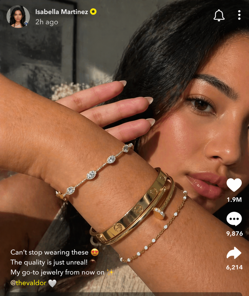 Close-up of a person wearing multiple bracelets with a visible brand logo on a social media platform.
