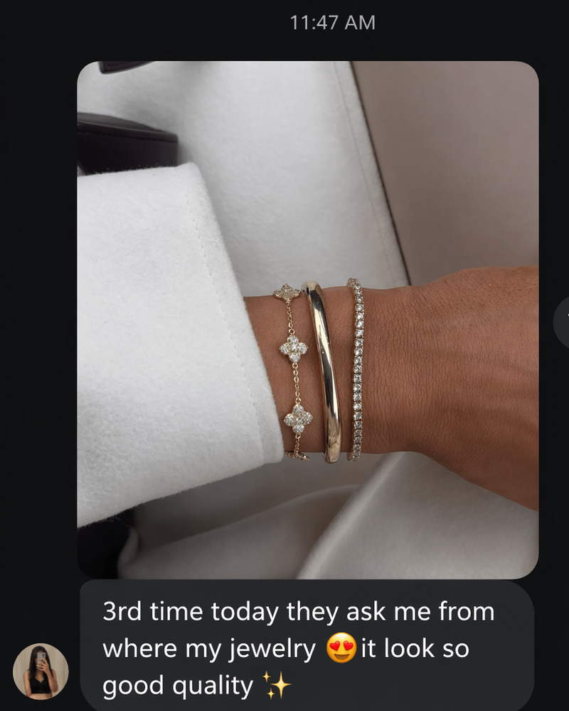 Close-up of a wrist wearing multiple bracelets with a text overlay on a messaging app interface.